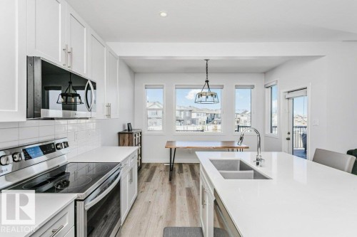 18 Elderberry Point(E), Fort Saskatchewan, AB - Indoor Photo Showing Kitchen With Double Sink With Upgraded Kitchen