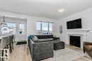 18 Elderberry Point(E), Fort Saskatchewan, AB  - Indoor Photo Showing Living Room With Fireplace 