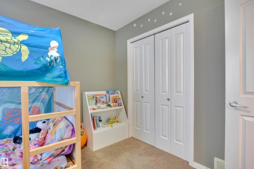 This room features light gray walls and plush carpeted flooring - 316 Avena Link, Leduc, AB - Indoor