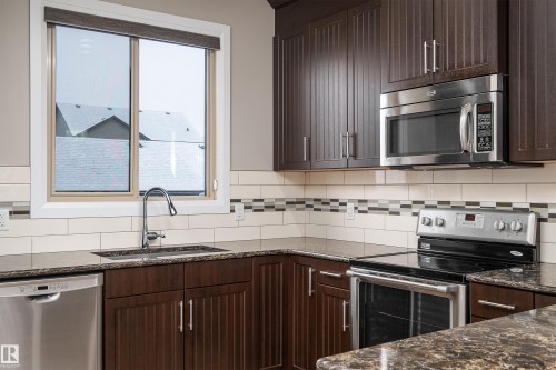 76 Gilmore Way, Spruce Grove, AB - Indoor Photo Showing Kitchen With Upgraded Kitchen