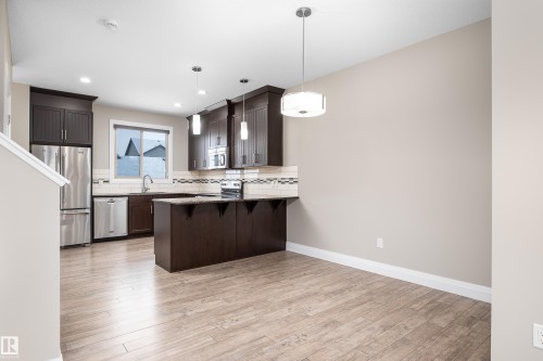 76 Gilmore Way, Spruce Grove, AB - Indoor Photo Showing Kitchen With Upgraded Kitchen