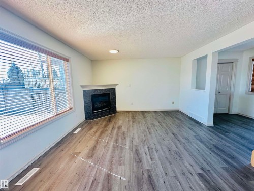 4811 152 Avenue, Edmonton, AB - Indoor Photo Showing Living Room With Fireplace