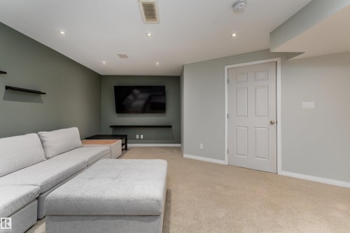 5911 8 Avenue, Edmonton, AB - Indoor Photo Showing Living Room
