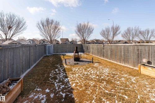 South facing backyard with two tier deck and fire pit - 5911 8 Avenue, Edmonton, AB - Outdoor