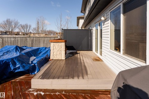 South facing backyard with two tier deck and fire pit - 5911 8 Avenue, Edmonton, AB - Outdoor With Deck Patio Veranda With Exterior