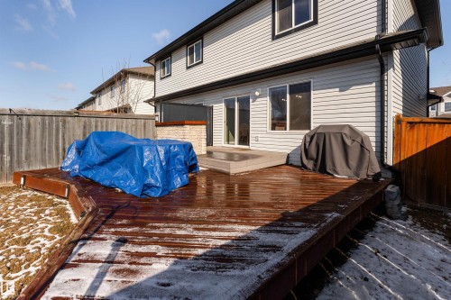 South facing backyard with two tier deck and fire pit - 5911 8 Avenue, Edmonton, AB - Outdoor With Deck Patio Veranda With Exterior
