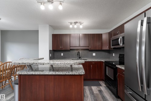 5911 8 Avenue, Edmonton, AB - Indoor Photo Showing Kitchen With Stainless Steel Kitchen