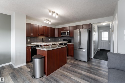 5911 8 Avenue, Edmonton, AB - Indoor Photo Showing Kitchen With Stainless Steel Kitchen