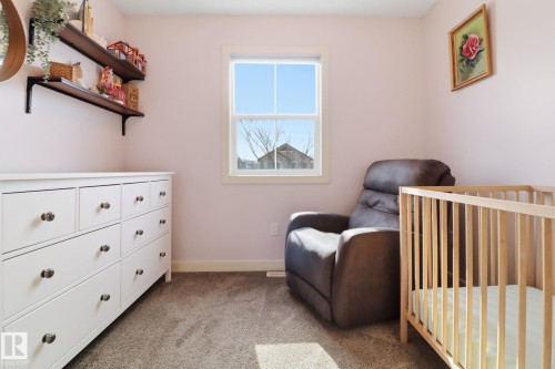 This room features light-colored walls and soft carpeting - 430 Watt Boulevard, Edmonton, AB - Indoor Photo Showing Bedroom