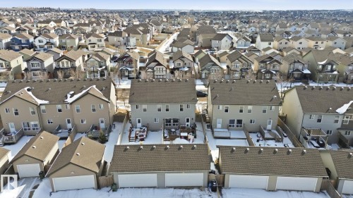 Aerial view of the property with a private fenced yard and a detached garage - 430 Watt Boulevard, Edmonton, AB - Outdoor
