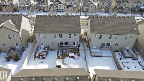 The property features a private fenced yard with a deck, offering outdoor space - 430 Watt Boulevard, Edmonton, AB - Outdoor