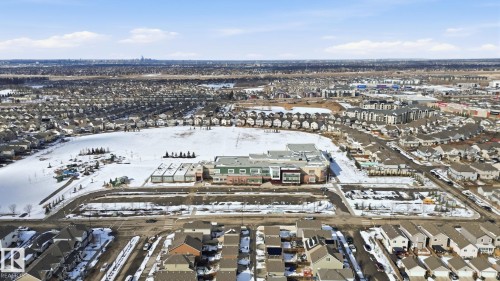 Aerial view showcasing the property's surrounding neighborhood with residential developments and open spaces - 430 Watt Boulevard, Edmonton, AB - Outdoor With View