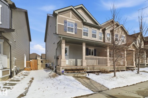 This property features a two-story exterior with multi-toned siding and shutters - 430 Watt Boulevard, Edmonton, AB - Outdoor With Deck Patio Veranda