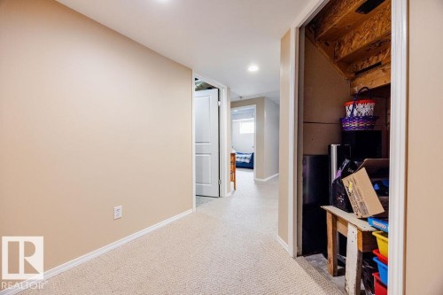 Hallway with neutral tone walls and carpet flooring - 7 Doucette Place, St. Albert, AB - Indoor Photo Showing Other Room