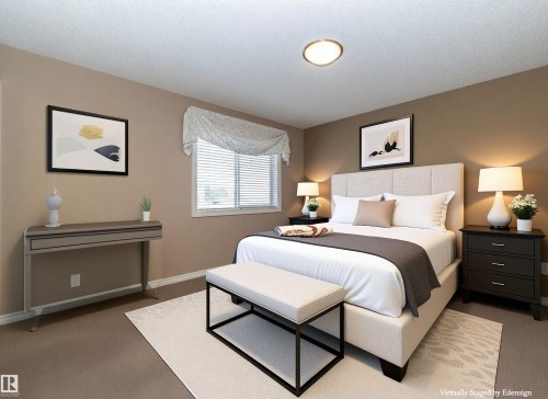 This room features a window with blinds, carpeted flooring, and neutral-toned walls - 130 Kirpatrick Way, Leduc, AB - Indoor Photo Showing Bedroom