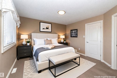 Bedroom with neutral-toned walls, carpeted flooring, and a window with blinds - 130 Kirpatrick Way, Leduc, AB - Indoor Photo Showing Bedroom