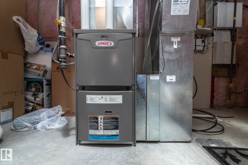 The property is equipped with a Lennox furnace and associated ductwork - 130 Kirpatrick Way, Leduc, AB - Indoor Photo Showing Basement