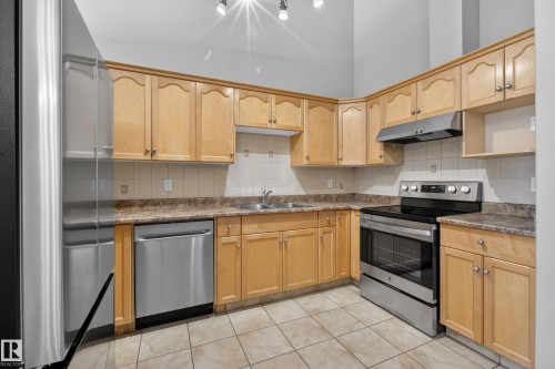 9808 162 Street, Edmonton, AB - Indoor Photo Showing Kitchen With Double Sink