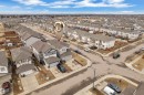 Aerial view of the property and its surrounding neighborhood, showcasing numerous detached homes with pitched roofs and front-facing garages - 1452 30 Street, Edmonton, AB  - Outdoor With View 