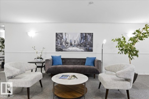 307 11716 100 Avenue, Edmonton, AB - Indoor Photo Showing Living Room