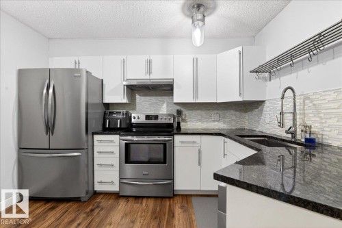 307 11716 100 Avenue, Edmonton, AB - Indoor Photo Showing Kitchen With Upgraded Kitchen