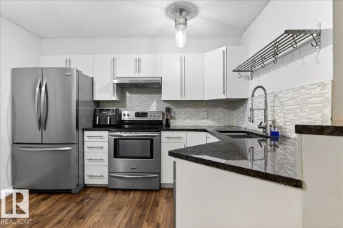 307 11716 100 Avenue, Edmonton, AB - Indoor Photo Showing Kitchen With Upgraded Kitchen
