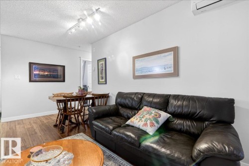 307 11716 100 Avenue, Edmonton, AB - Indoor Photo Showing Living Room