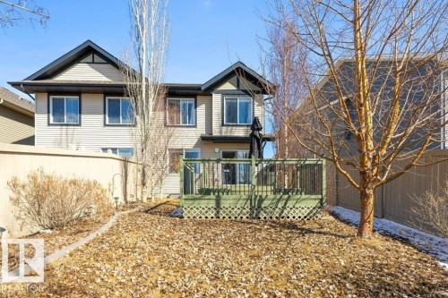 The property features a two-story exterior with siding, a gabled roof, and multiple windows - 3119 Carpenter Landing Landing, Edmonton, AB - Outdoor