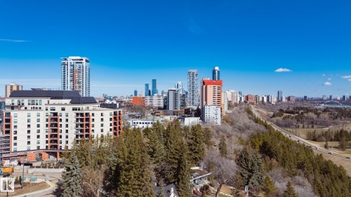 The property is situated in a vibrant urban setting, surrounded by residential buildings and established green spaces - 206 10108 125 Street, Edmonton, AB - Outdoor With View
