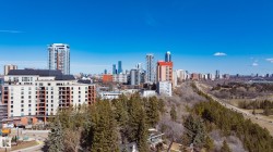 The property is situated in a vibrant urban setting, surrounded by residential buildings and established green spaces - 