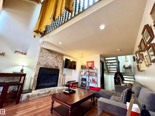 10346A 121 Street, Edmonton, AB - Indoor Photo Showing Living Room With Fireplace