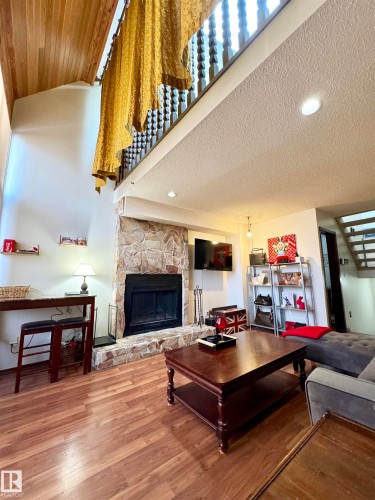 10346A 121 Street, Edmonton, AB - Indoor Photo Showing Living Room With Fireplace