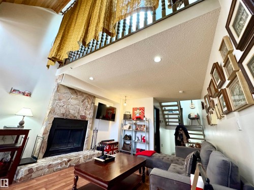 10346A 121 Street, Edmonton, AB - Indoor Photo Showing Living Room With Fireplace