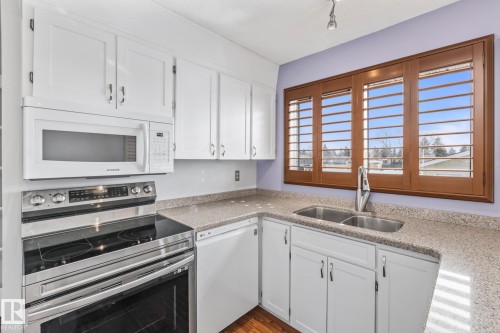 8715 43 Avenue, Edmonton, AB - Indoor Photo Showing Kitchen With Double Sink