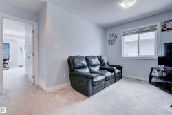 The property features light gray walls and plush carpeting, creating a neutral and inviting atmosphere - 