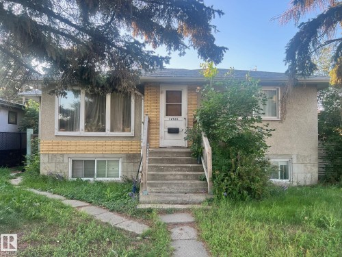 Bi-level home featuring brick siding - 12720 135 Avenue, Edmonton, AB - Outdoor