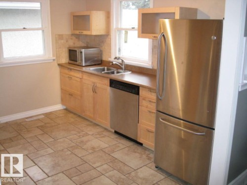 12720 135 Avenue, Edmonton, AB - Indoor Photo Showing Kitchen With Double Sink