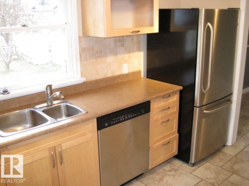 12720 135 Avenue, Edmonton, AB - Indoor Photo Showing Kitchen With Double Sink