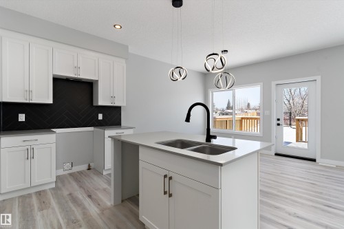 36 Maple Crescent, Gibbons, AB - Indoor Photo Showing Kitchen With Double Sink