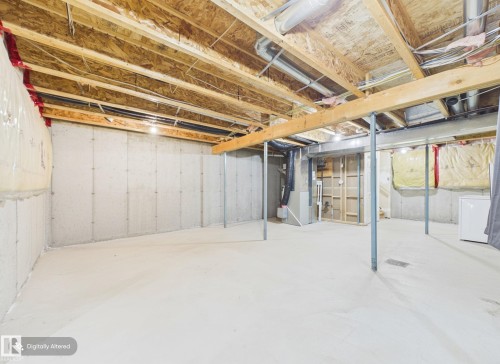 The property features an unfinished basement with concrete walls and floor, exposed ceiling joists, and visible utility conduits - 9073 Scott Crescent, Edmonton, AB - Indoor Photo Showing Basement