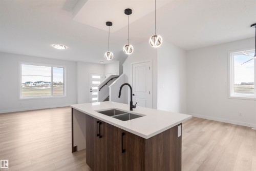 258 Black Stone Drive, Leduc, AB - Indoor Photo Showing Kitchen With Double Sink With Upgraded Kitchen