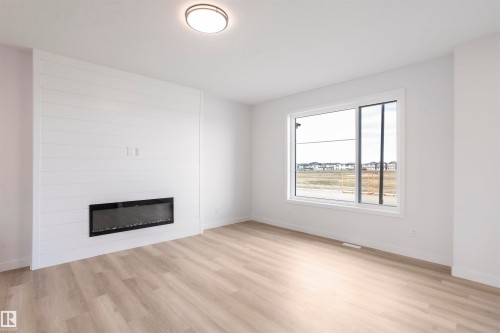 258 Black Stone Drive, Leduc, AB - Indoor Photo Showing Living Room With Fireplace