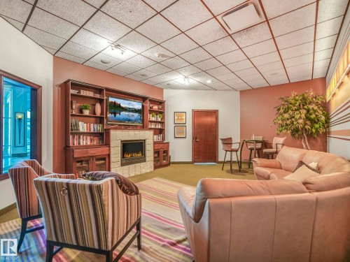 511 10142 111 Street, Edmonton, AB - Indoor With Fireplace