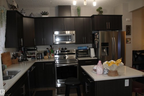 405 Orchards Boulevard, Edmonton, AB - Indoor Photo Showing Kitchen With Stainless Steel Kitchen With Double Sink With Upgraded Kitchen