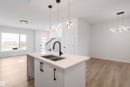 463 Bank Wynd, Leduc, AB - Indoor Photo Showing Kitchen With Double Sink With Upgraded Kitchen