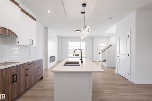 463 Bank Wynd, Leduc, AB - Indoor Photo Showing Kitchen With Double Sink With Upgraded Kitchen