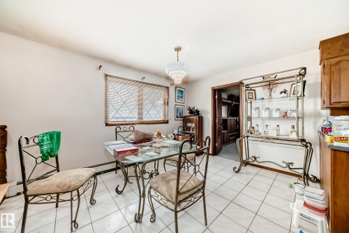White tile flooring - 208 Willow Crescent, Wetaskiwin, AB - Indoor