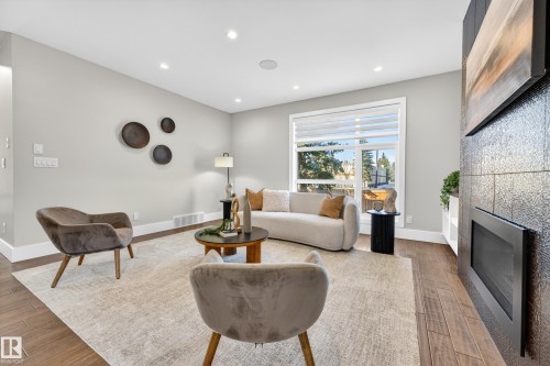 14132 97 Avenue, Edmonton, AB - Indoor Photo Showing Living Room With Fireplace