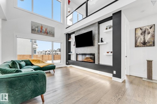 3130 Kostash Green, Edmonton, AB - Indoor Photo Showing Living Room With Fireplace