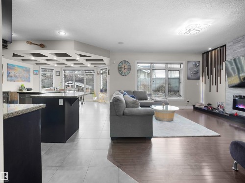 2422 Warry Place Sw, Edmonton, AB - Indoor Photo Showing Living Room With Fireplace